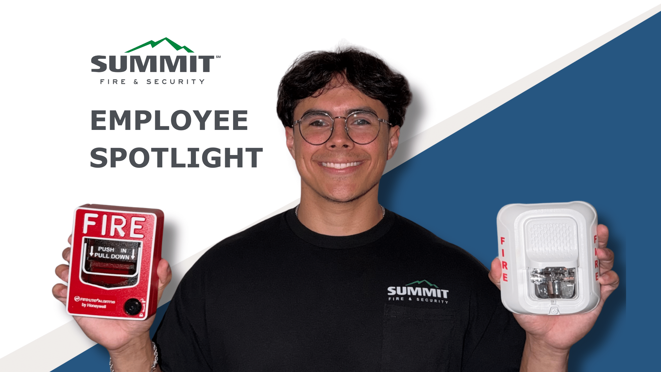 Steven holding up two different types of fire alarms