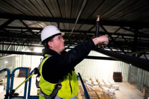 Technician working on an industrial sprinkler